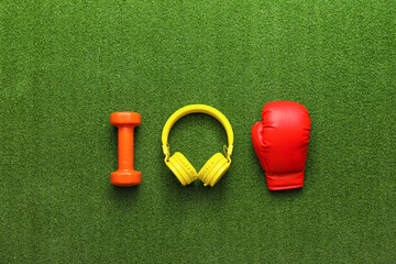 Set of sport equipment on color background