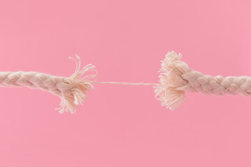 Breaking rope on color background