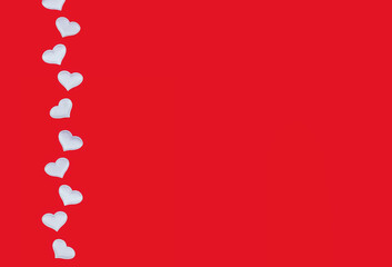 White hearts on red background. Minimalistic postcard, invitation. Copy space. Top view. Concept for choosing gifts for Valentine's Day or romantic date