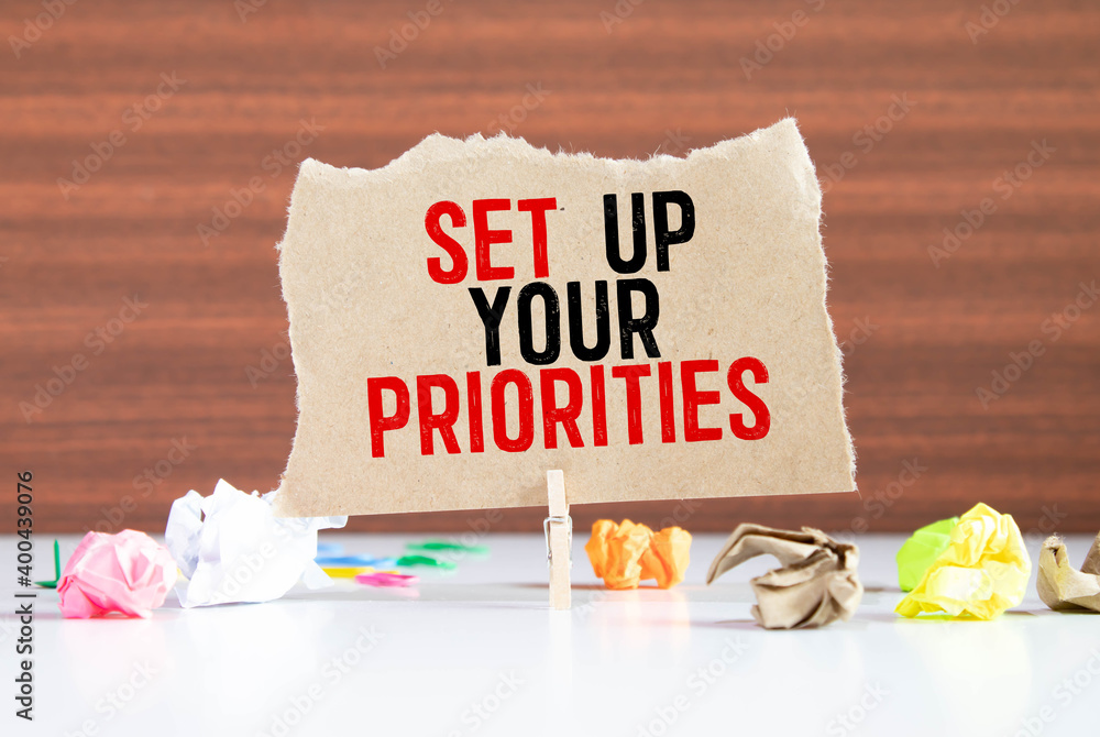 Poster black calculator with text set up your priorities on the white background