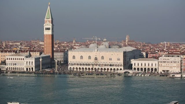 Campanila bell tower at piazza San Marco from the other side of a channel, Venice, Italy