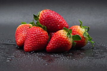 red strawberries whole and in pieces. Fresh fruit