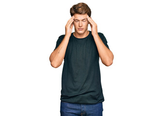 Handsome caucasian man wearing casual clothes with hand on head for pain in head because stress. suffering migraine.