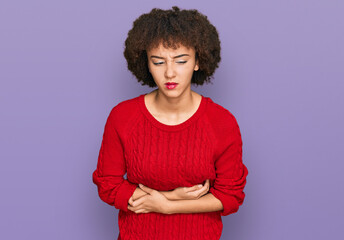 Young hispanic girl wearing casual clothes with hand on stomach because nausea, painful disease...