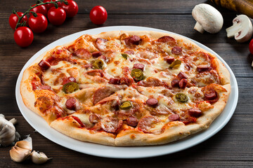 Pizza Pepperoni Salami Bacon and Hamon with Cheese, homemade italian pizza with mozzarella and bacon