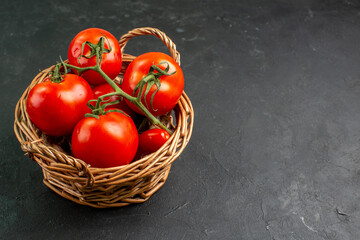 front view fresh red tomatoes inside basket on a dark background food red salad photo