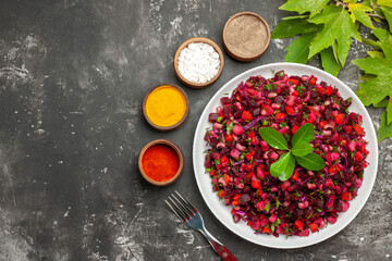top view delicious vinaigrette beet salad with beans on dark background diet health