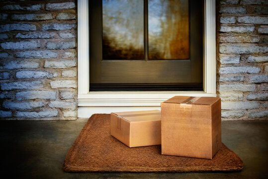 Delivered outside the door, e-commerce purchase boxes on door mat. Add your own copy and label