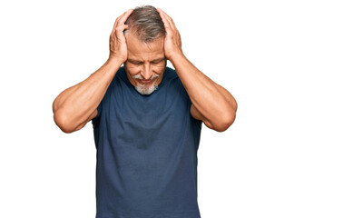 Naklejka premium Middle age grey-haired man wearing casual clothes suffering from headache desperate and stressed because pain and migraine. hands on head.