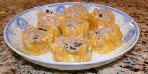 Shaomai:  steamed open dumpling： Chinese Cuisine