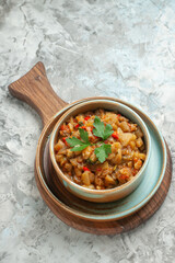 top view roasted eggplant salad in bowl on grey background free space food photo