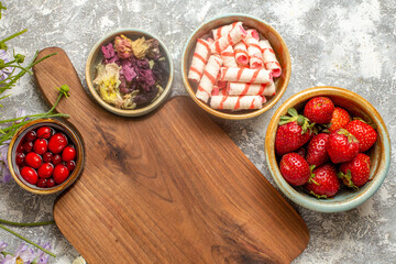 top view fresh red strawberries with flowers on a white background berry fruits red candy