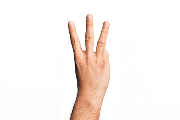 Obraz premium Hand of caucasian young man showing fingers over isolated white background counting number 3 showing three fingers