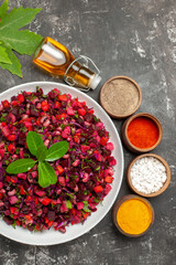 top view tasty vinaigrette beet salad with seasonings on dark background food health diet meal