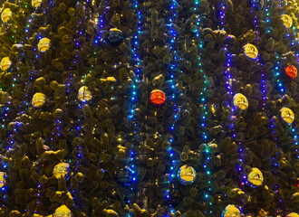 Christmas tree with colorful balloons and garlands
