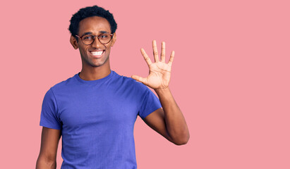 African handsome man wearing casual clothes and glasses showing and pointing up with fingers number five while smiling confident and happy.