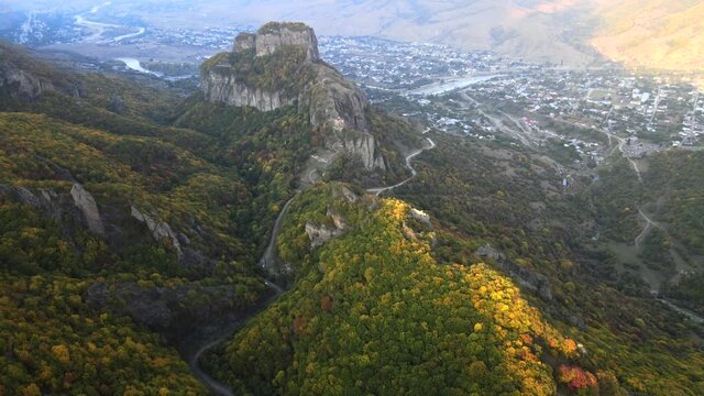 Christian active Shoanin temple. X century. Karachay-Cherkessia, Teberda, Russia. Mountain open. Drone shooting