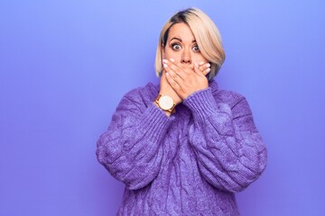 Beautiful blonde plus size woman wearing casual turtleneck sweater over purple background shocked covering mouth with hands for mistake. Secret concept.