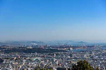 Obraz premium Fukuyama City seen from the top of the mountain. (Residential and industrial area)