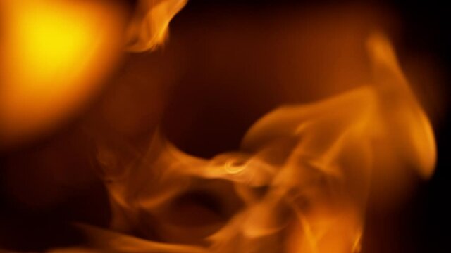 Super slow motion of flames isolated on black background. Filmed on high speed camera, 1000 fps