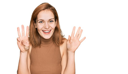 Fototapeta premium Young caucasian woman wearing casual clothes showing and pointing up with fingers number eight while smiling confident and happy.