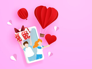 loving couple giving gift box and red heart from mobile phone