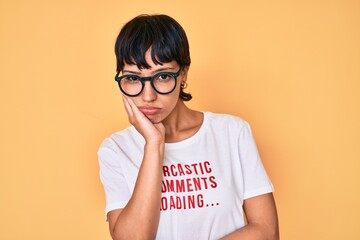 Beautiful brunettte woman wearing sarcastic comments loading t-shirt thinking looking tired and...