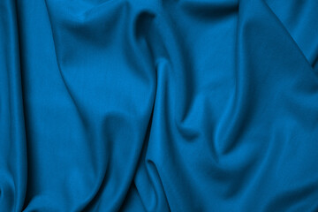 Blue silk folded fabric background