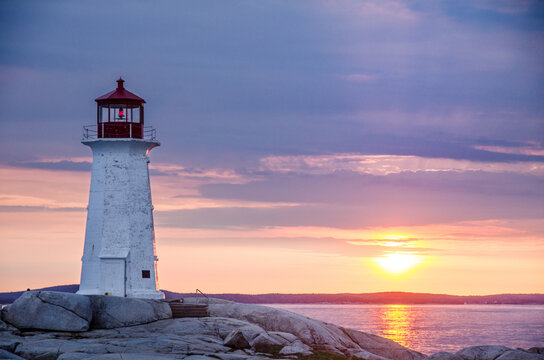 Peggy's Cove lighthouse at sunset