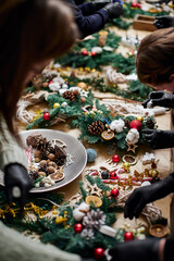 making Christmas wreaths handmade close-up crafts