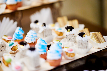 cakes on the table snack close-up light frame different sweets