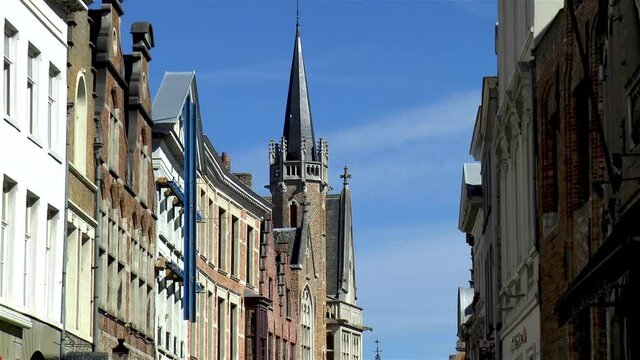 Traditional, medieval buildings on Wollestraat, Bruges, West Flanders, Belgium.