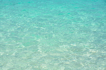 Beautiful beach with white powder sand and striking turquoise waters.