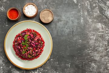 top view vinaigrette salad with seasonings on dark desk photo health meal