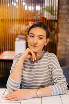 City Coffee House Portrait Of A Young Chic Woman With Pixie Cut