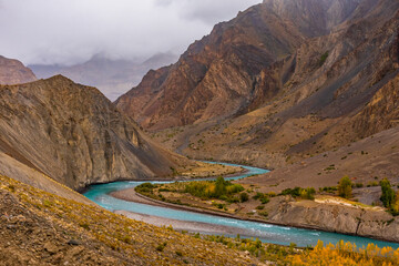 Meander is one of a series of regular sinuous curves in a river, produced by river as it erodes the...