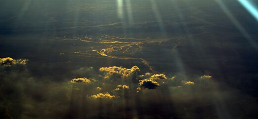 Fototapeta premium Aerial view of clouds and sky. Bird eye view from airplane window. Clouds panorama from airplane. Flight from Kiev to Sharm El Sheikh, Egypt.