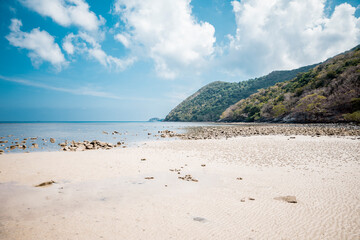 Beautiful tropical beach with blue sky and white sand at Con Dao Island, Viet Nam