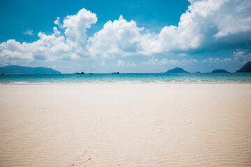 Beautiful tropical beach with blue sky and white sand at Con Dao Island, Viet Nam