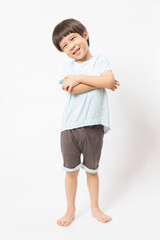 portrait of cute little Asian boy with happy face, he laughing smiles and looking to camera isolated on white background.