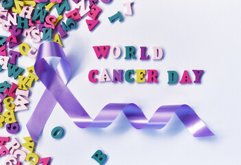 World cancer day word and purple awareness ribbon