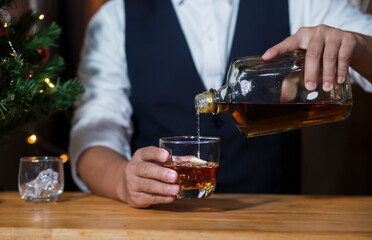 Bartender Serve Whiskey, on wood bar, 
