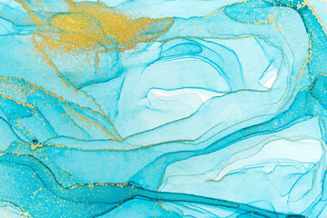 Fototapeta na wymiar Abstract layers of blue paint background. Blue and gold watercolor pattern.