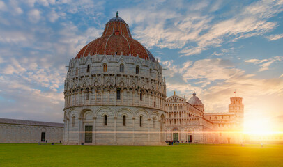 Cathedral (Duomo of Santa Maria Assunta) and The Baptistery of Pisa Leaning Tower at the Piazza dei...