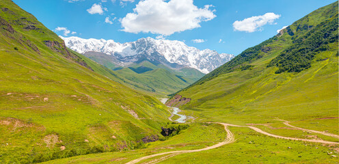 Fototapeta na wymiar Beautiful landscape with Mount Shkhara, Ushguli village Upper Svaneti, Georgia