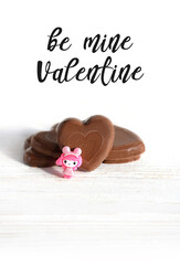 be mine Valentine greeting card. chocolate candies hearts and mini toy baby. Valentine's day, 14 february romantic sweet gift cute concept