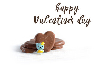 Happy Valentine's day. chocolate candies hearts and mini teddy bear. Valentine's day, 14 february romantic sweet gift cute concept. symbol of love