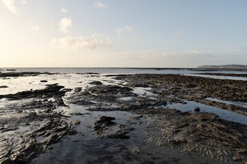  low tide beach at sunset