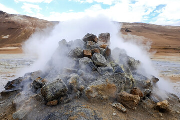 mountain of stones of fumaroles in field of sulfur of namafjall,iceland