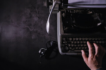 Vintage journalist tool. Typewriter retro. The writer is at work. Seal of the novel. Journalist...